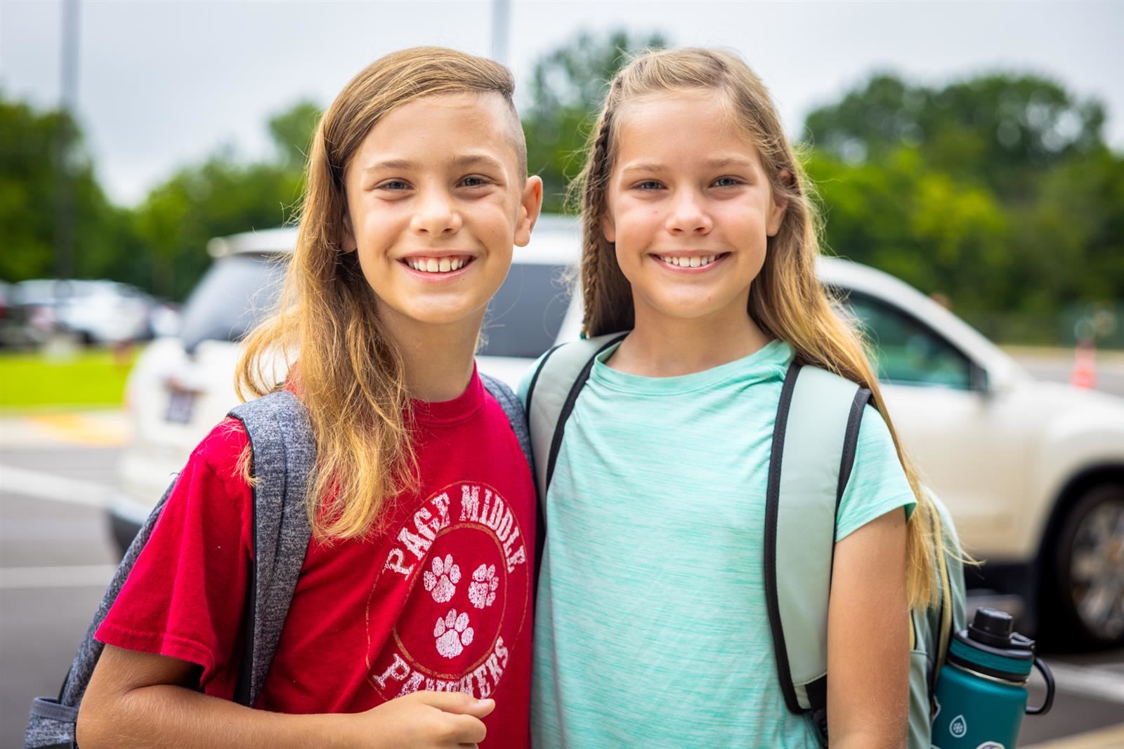  Two students smiling
